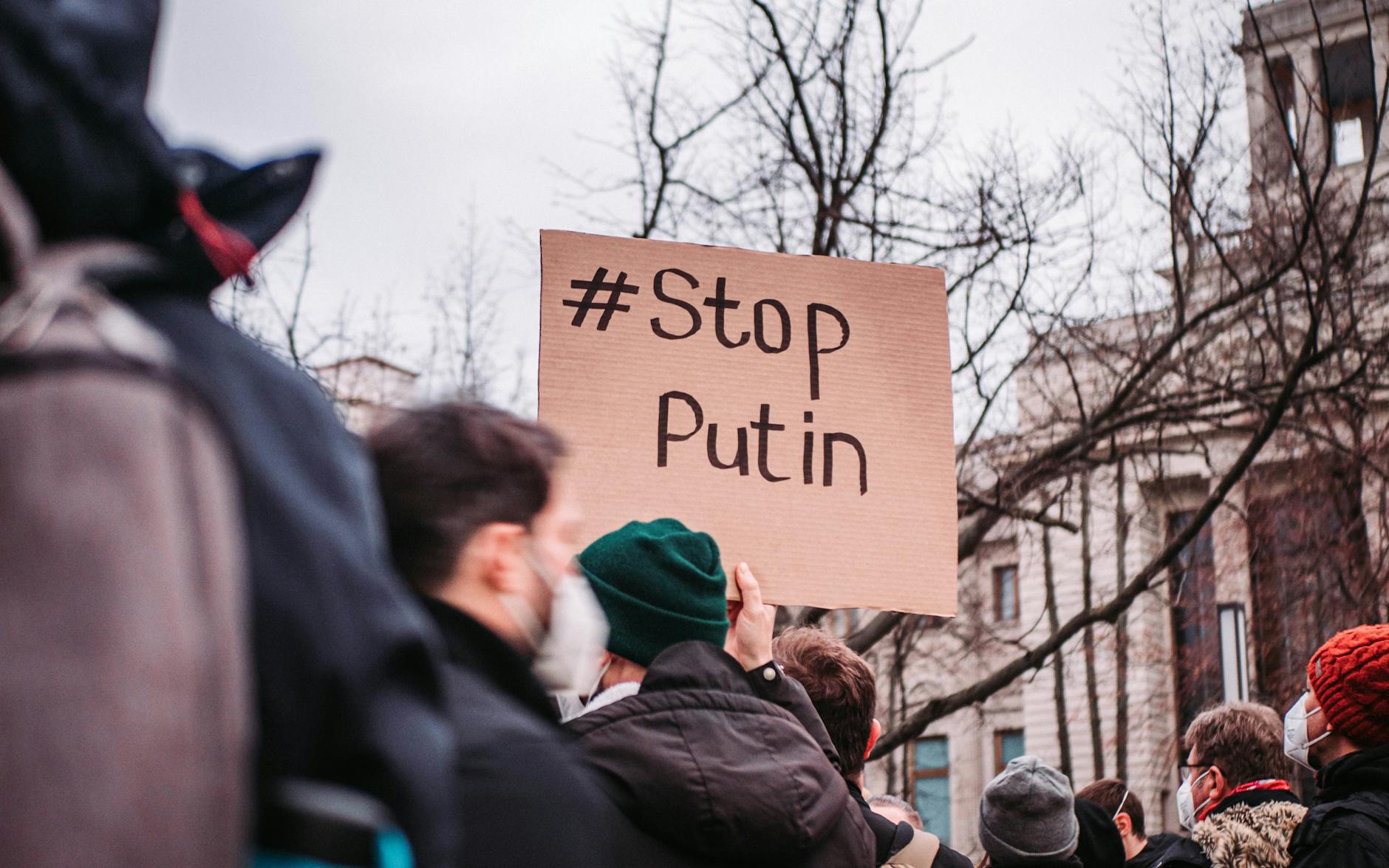 people in the street protesting against war